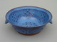 All of the small colanders designs are available in a larger size...